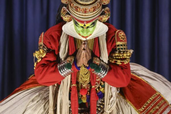 Kathakali dancer in full costume performing traditional Indian theater