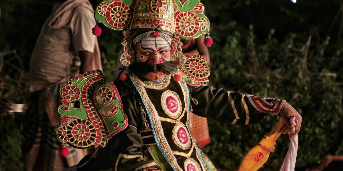 Therukoothu street theater performer in elaborate costume and headdress